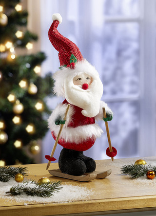 Jultomten på skidor