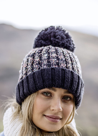 Termisk hatt med pompom från Heat Holders® för mer komfort på vintern
