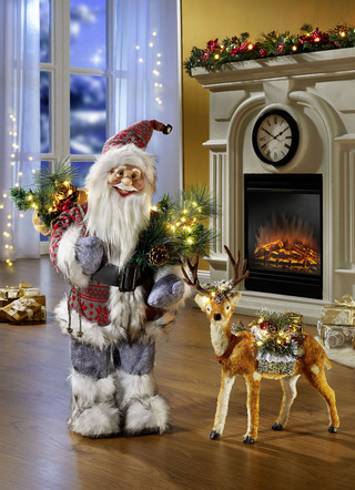Jultomten och renar av konstgjort och textilmaterial