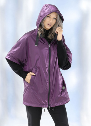 Funktionell vändbar cape i överdimensionerad look