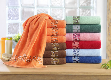 Terry handdukserie med jacquardkant