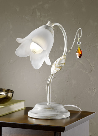 Bordslampa med järnram och lampskärm i glas