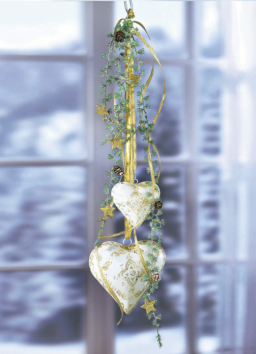Heminredning - Dekorativ hängare med hjärtan av metall, i färg
