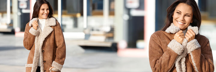 Kvinna i en vinterjacka i lammskinn