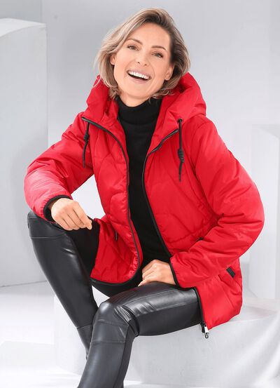 Jacka med förlängd rygg 