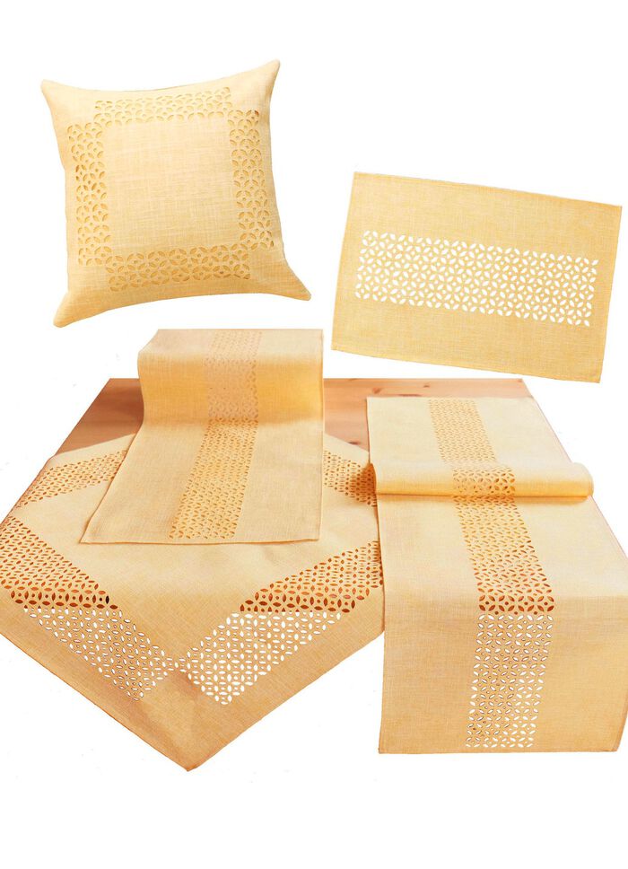 Duk med dekorativ hålslagning GUL