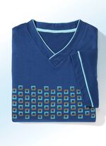 Tv&aring;delat nattlinne med V-ringning och slitsar i sidorna 