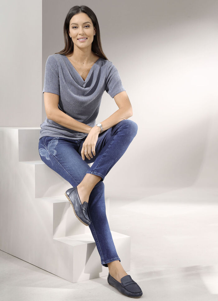 Magiska jeans med fjärilstvätteffekt 