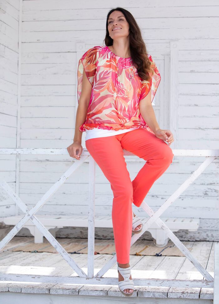 Ponchotunika med integrerad topp 