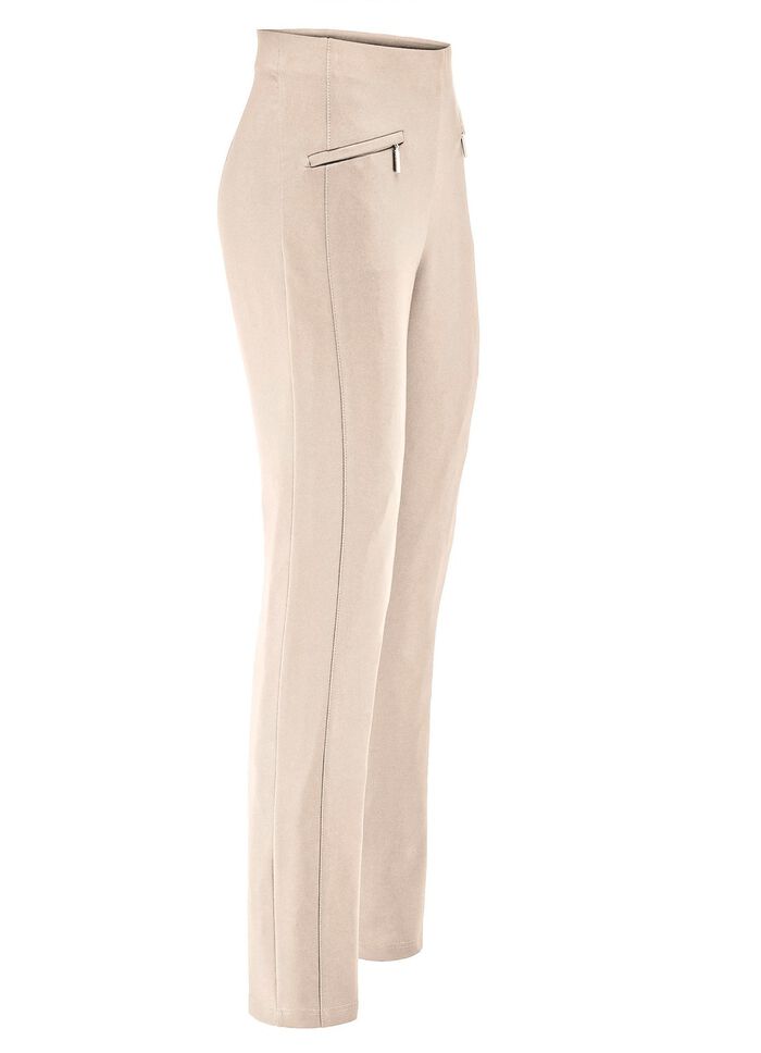 Byxor med dragkedjor p&aring; fickorna 