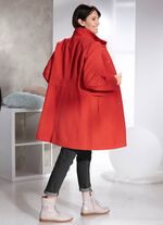 Kort kappa med s&ouml;mfickor 