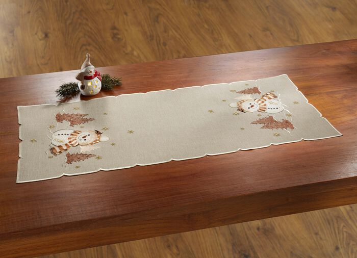 Broderade bords- och rumsdekorationer 