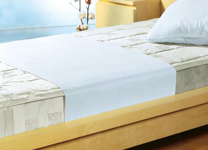 Molton inkontinensskydd i korsform fr&aring;n Setex 