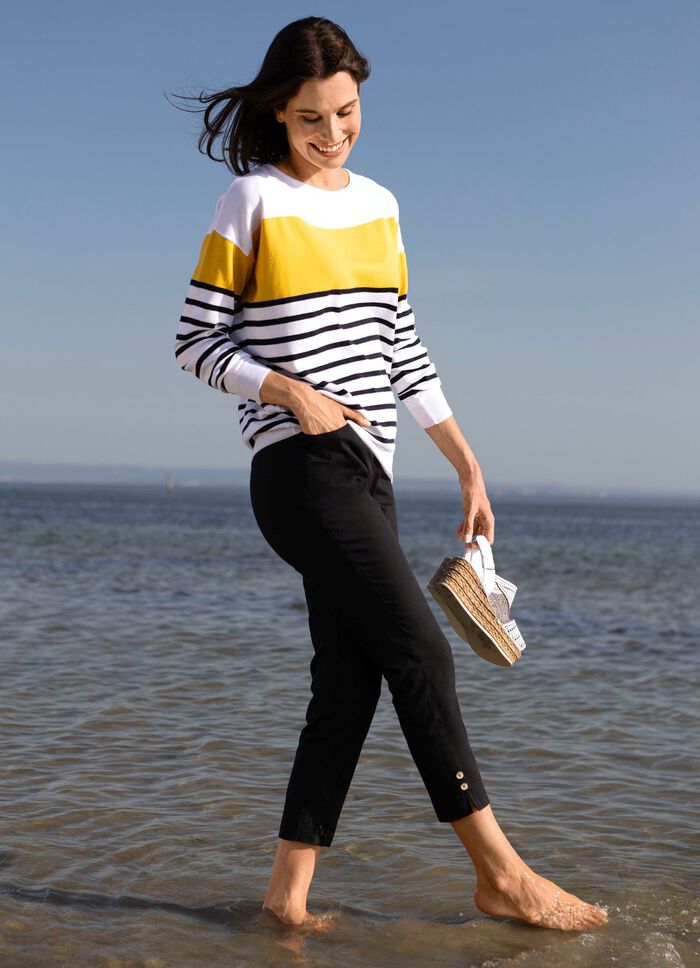 Byxor med dekorativa knappar 