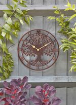 Väggklocka med motiv av livets träd 