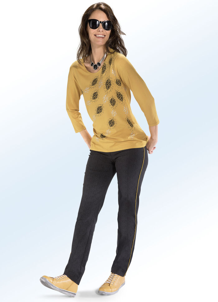 Byxor i en subtil fiskbenslook 