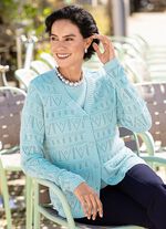 Stickat twinset med genombrutna detaljer 