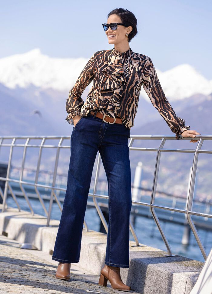 Blus med lekfulla volanger 