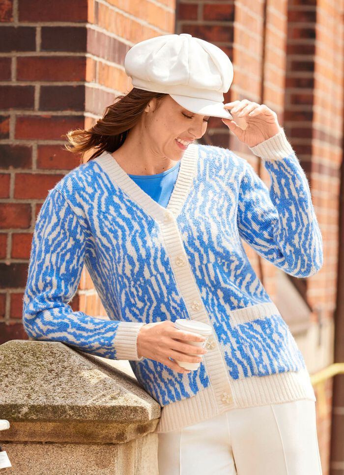 Kofta i utarbetad jacquarddesign 