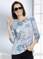 Tröja tillverkad av mjukt, böljande material 