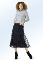 Plisserad kjol i blommig spetslook 