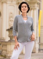 Kofta med subtila glittereffekter 