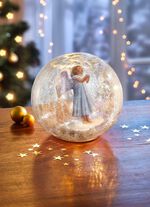 Glaskula med belysning 