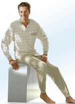 Pyjamas med knappslå och ärmslut 