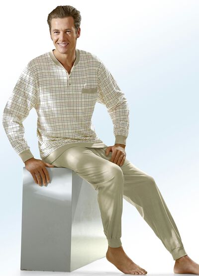 Pyjamas med knappslå och ärmslut 