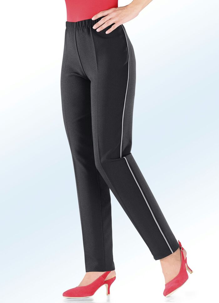 Byxor med trendiga kontrasterande dekorativa passpoaler 