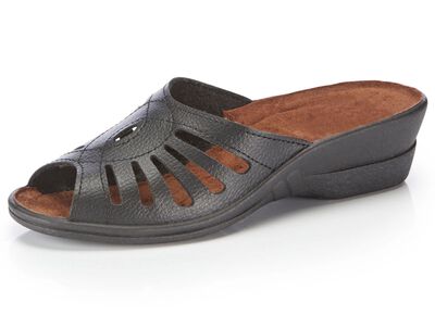 Mulor med dekorativa perforeringar 