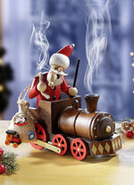 Träfigur av jultomten som röker 