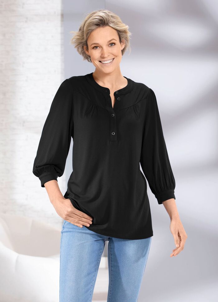 Skjorta med kort knappsl&aring; i 2 f&auml;rger 