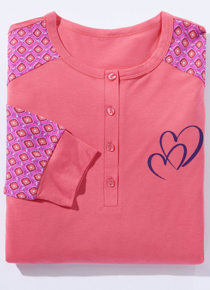 Förpackning om två nattlinnen med sidoslitsar och knappslå 