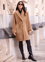 Kort kappa med sneda fickor 