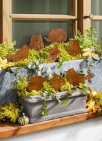 Dekorpluggar av rostig metall, set om 8 