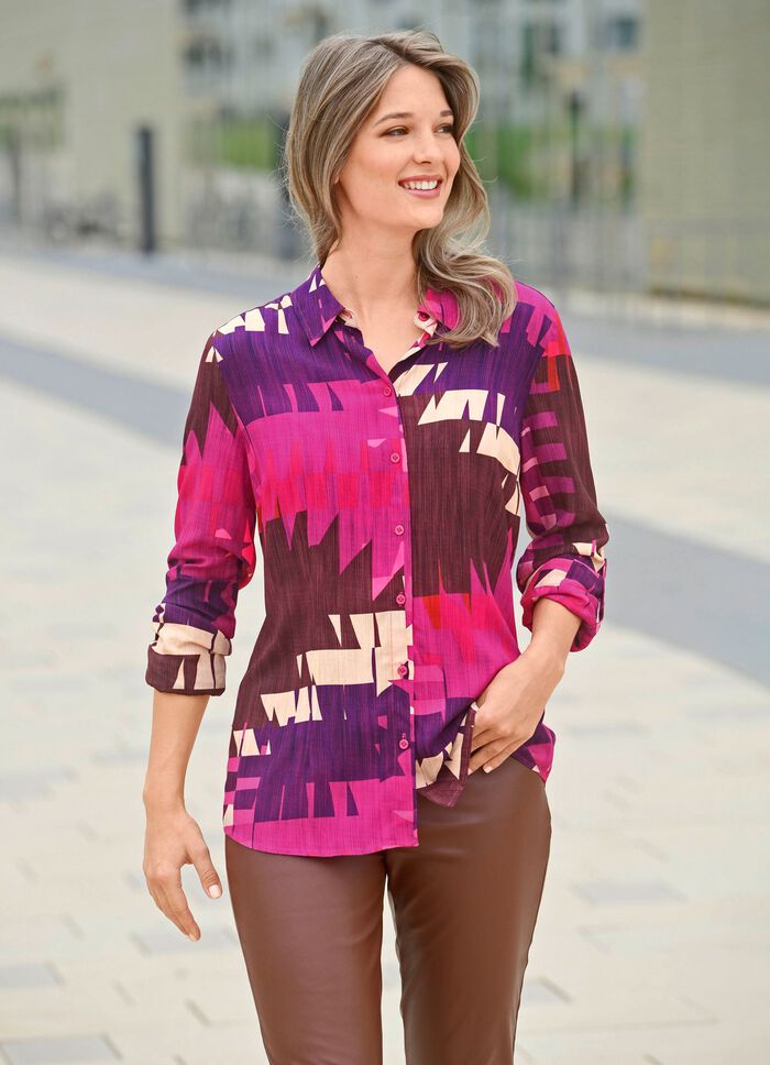 Blus med briljant f&auml;rgat tryck 