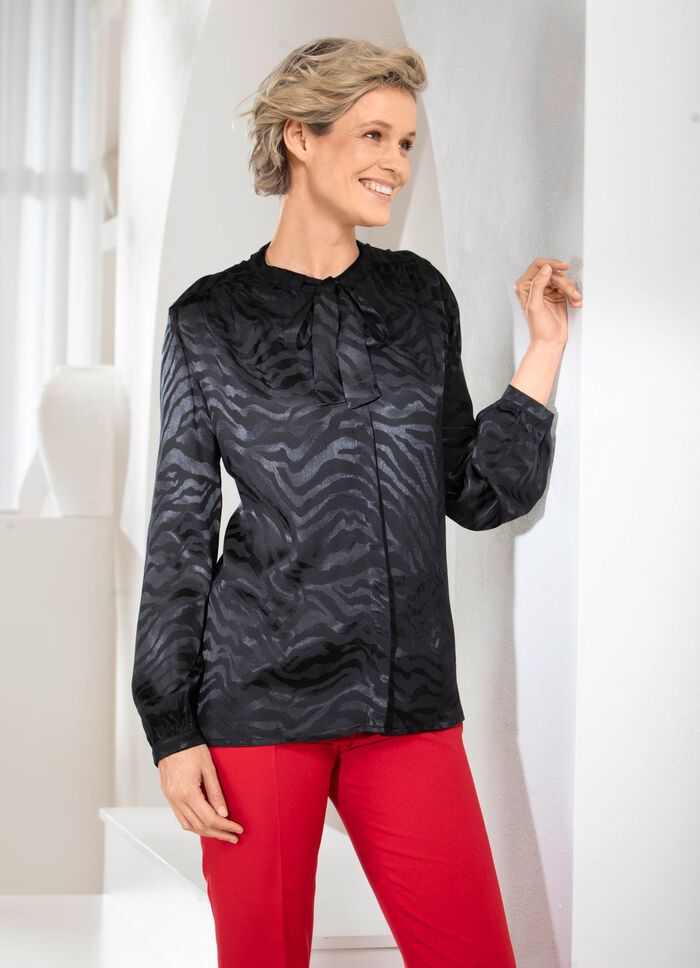 Blus med djurlook i 2 f&auml;rger 