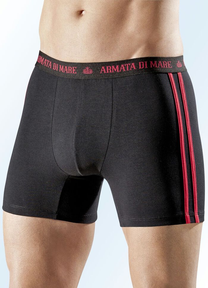 Paket med fyra byxor, enf&auml;rgade med kontrasterande r&auml;nder 