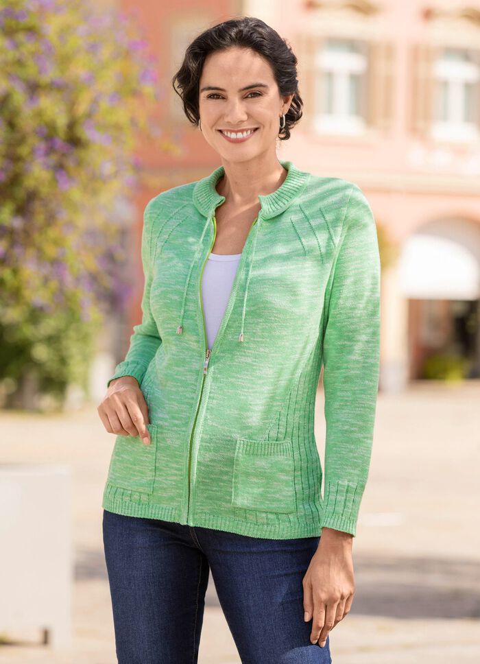 Kofta med stickade kanter och fickor 