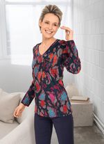 Skjorta med dekorativa stenar p&aring; framsidan 