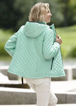 Jacka med figursmickrande längsgående quiltning på sidan AQUA