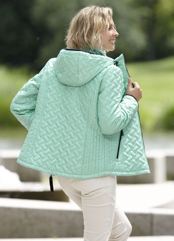 Jacka med figursmickrande längsgående quiltning på sidan AQUA