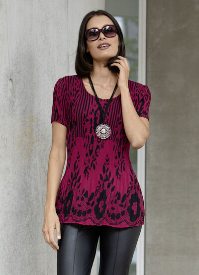 Tunika med kanttryck 