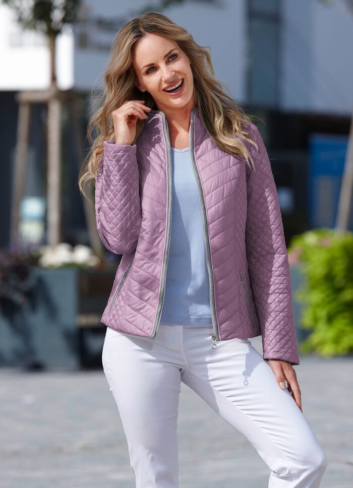 Jacka med dragkedjefickor 