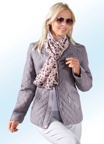 Jacka med kontrastf&auml;rgad piping 