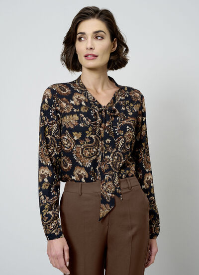 Blus med knytringning 