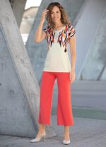 Topp med strass- och paljettdekor 