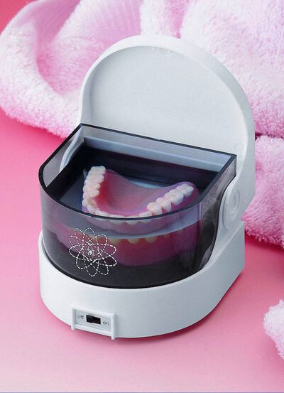 Automatisk tandprotesreng&ouml;rare 