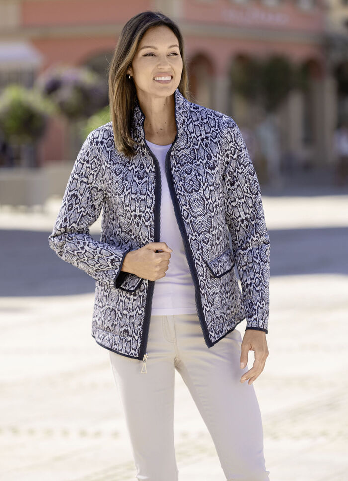 Funktionell v&auml;ndbar jacka med reptildesign 